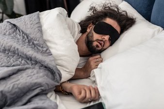 better sleep nice brunette man snoring while sleeping mask 259150 42526