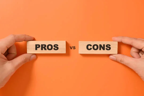 Pros and cons text on wooden blocks,